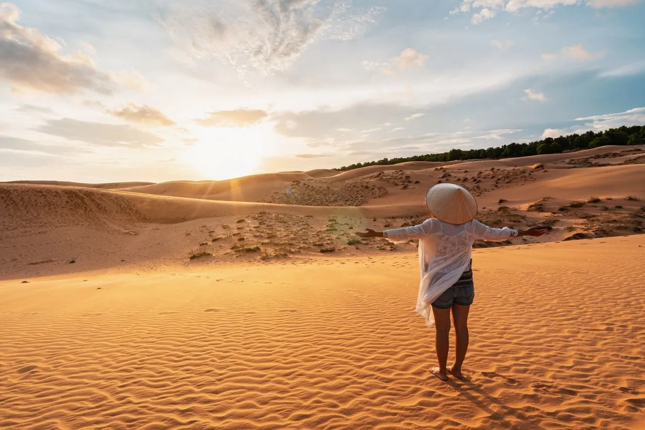young-woman-traveler-looking-sunset-at-red-sand-du-2023-11-27-04-51-54-utc_1575x1050_1280x853_converted